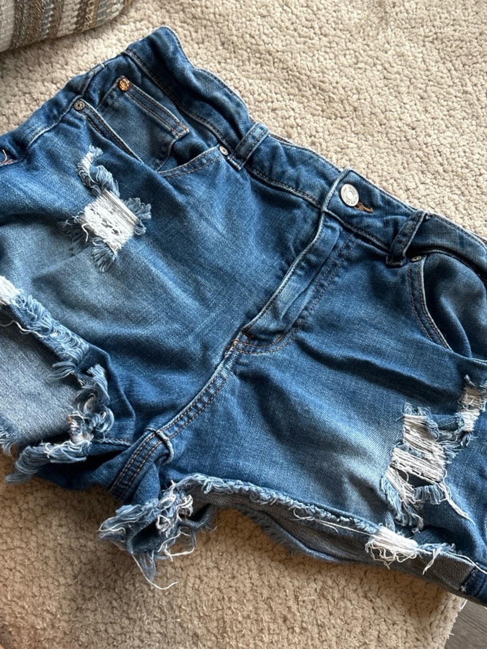 Distressed Blue Denim Jean Shorts with Frayed Hem